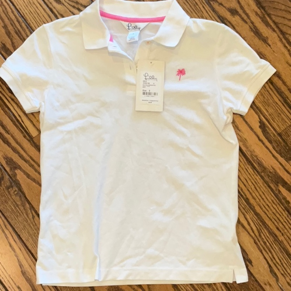 White Women’s Polo Shirt with Pink Logo